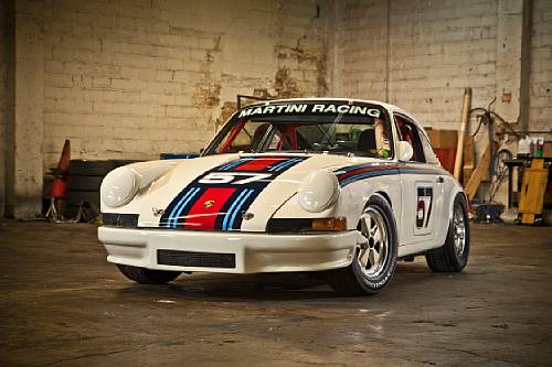 This 1969 Porsche 911S is a real looker with the Martini colors and full