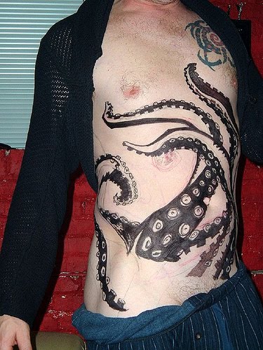 tattoo artists black ctopuc tattoo in front body