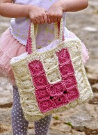 http://www.ravelry.com/patterns/library/peeps-a-boo-bag