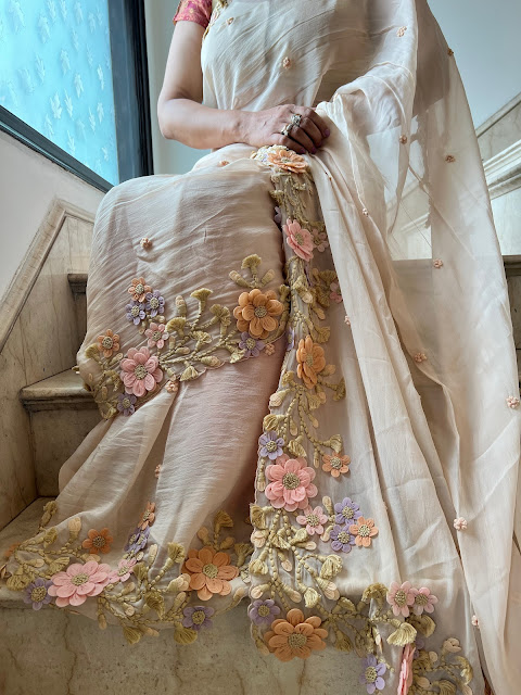 Sandalwood French chiffon saree with hand done flowers.