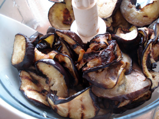 chopping roasted eggplant