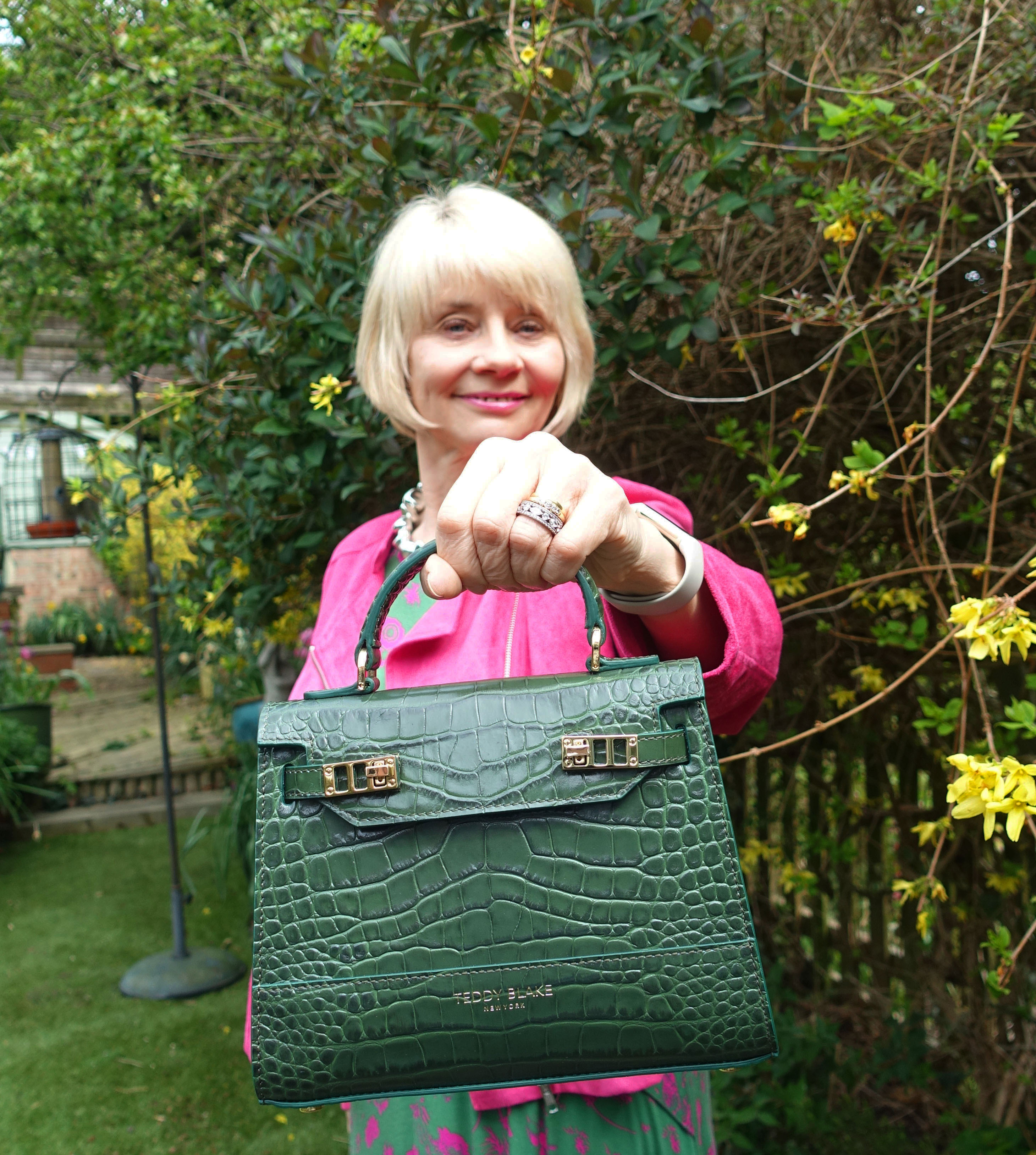 A Teddy Blake handbag and a dress over jeans - The Grey Brunette