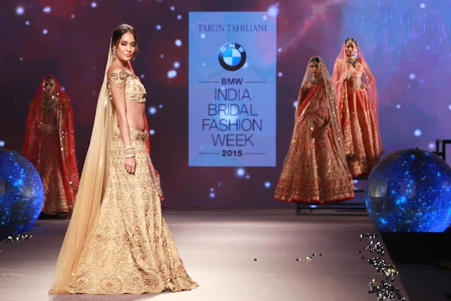 Lisa Haydon in Golden off Shoulder Lehenga for the Tarun Tahiliani Bridal Collection 2015