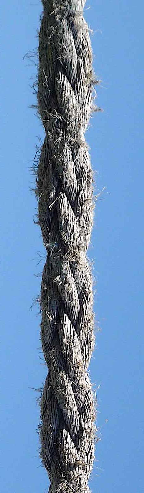 a color photograph of thick old ship mooring rope