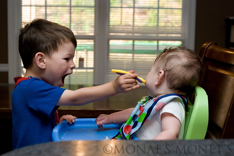 Scott feeding Ryan 2 blog