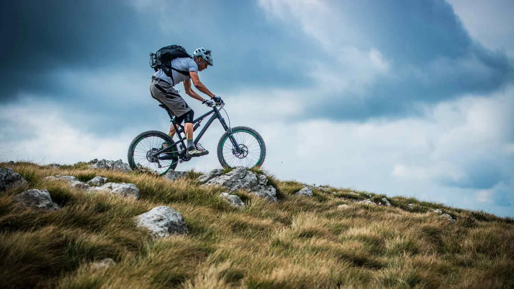 A man on a mountain bike, stock image from Canva pro