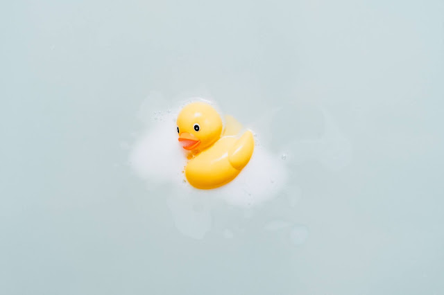 duck in bubble bath. Photo by insung yoon on Unsplash