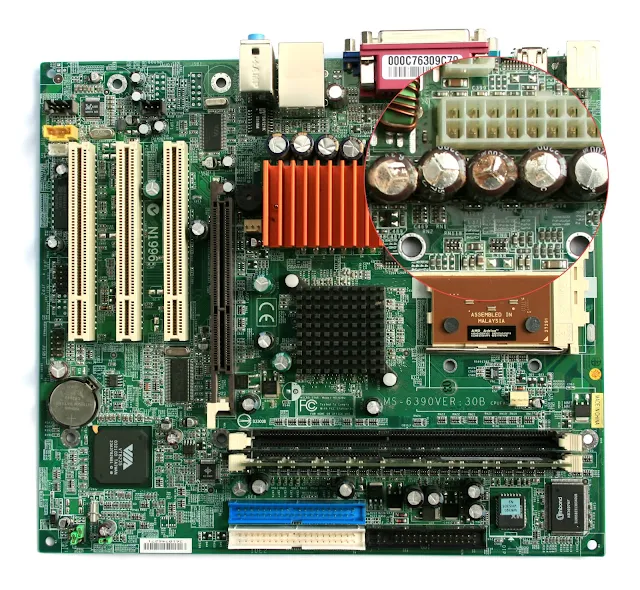 MicroATX Motherboard with AMD Athlon Processor - A microATX motherboard with some faulty capacitors