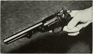 Walch revolver of unique two-hammer design discharged first one shot, then a second, from same chamber before rotating cylinder one index notch as both hammers were recocked.