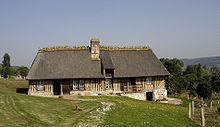 Vernacular half-timbered thatched cottage