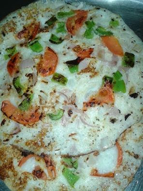 http://jollyhomemaderecipes.blogspot.in/2014/05/delicious-onion-tomato-uttapam-veggie.html