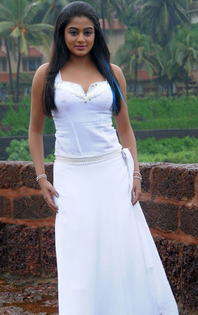 Tamil actress Priyamani stuns in a white dress, exuding elegance and grace in her latest hot stills.