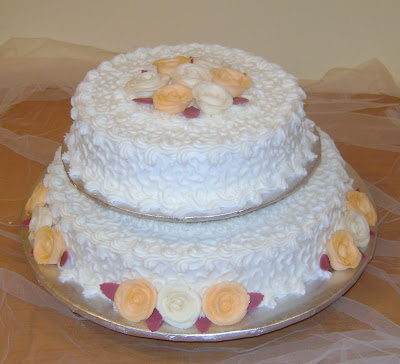 Peach & white two-tiered cake