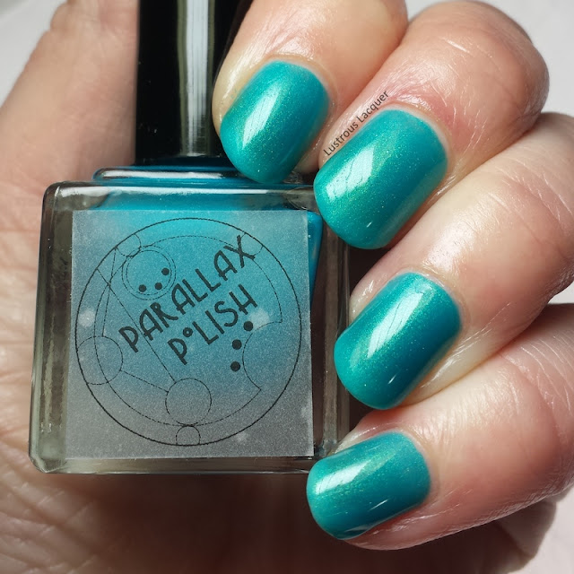 Sea-Foam-Secrets-7-seas-collection-Parallax-Polish-shimmer-teal-nail-polish-with-a-golden-glow