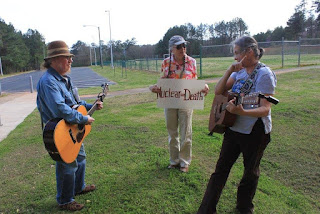 Tom Ferguson and Joanne Steele led us in song.