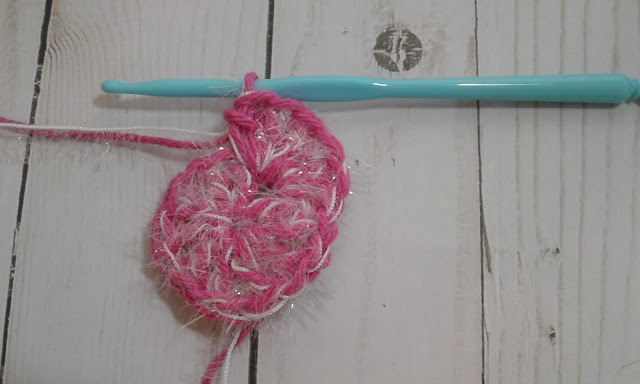 make four double crochet into the chain one space