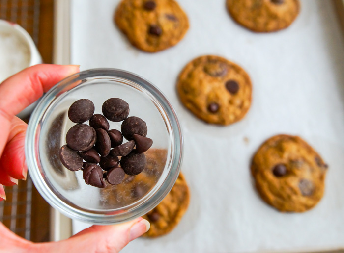 chocolate chips pressed into warm cookies