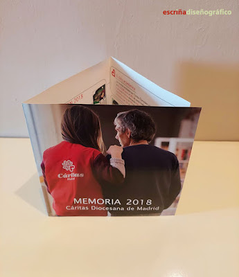 Portada del tríptico de la memoria de actividades de Cáritas Madrid