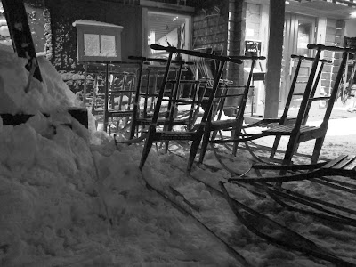 kick sleds parked out side of tavern in Norway