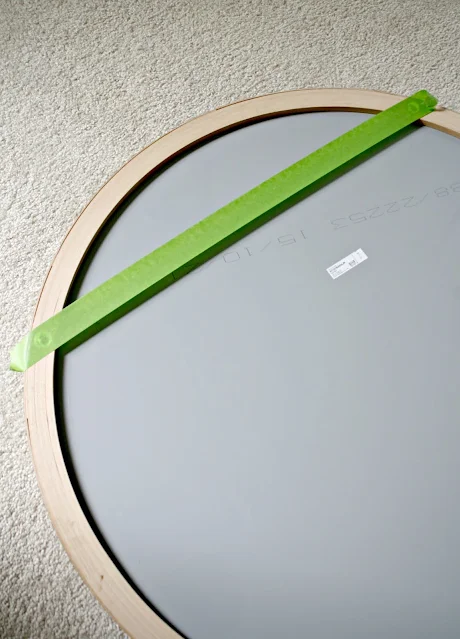 painter's tape hanging art trick