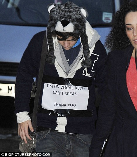 ... sore throat and wore a sign round his neck as he arrived to rehearsals