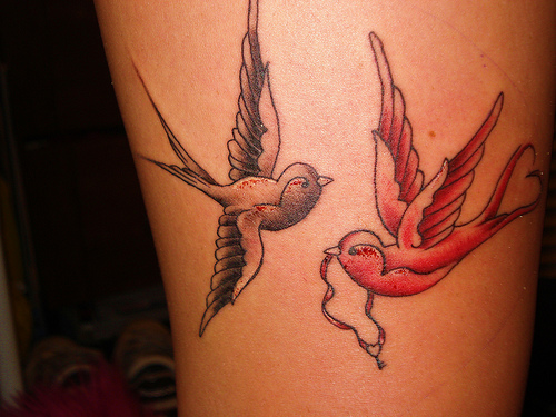 Women Tattoo Sparrow tattoos get confused with swallow tattoos all the time