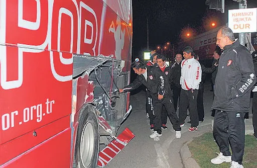 The Samsunspor club bus is seen after colliding with a train