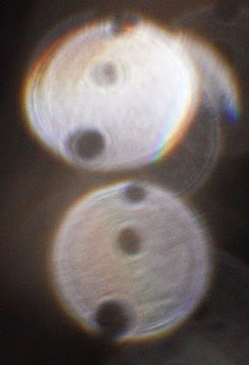 column of orb holes