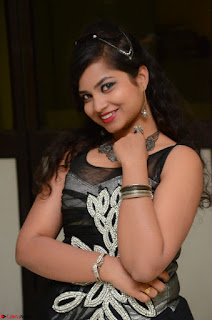 Shrisha Dasari in Sleeveless Short Black Dress At Follow Follow U Audio Launch 068.JPG