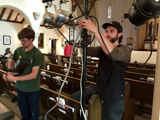 Brett, Bass, and Graham, tenor, work hard to ready the lights for Saturday