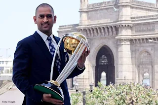 M.S Dhoni with cup