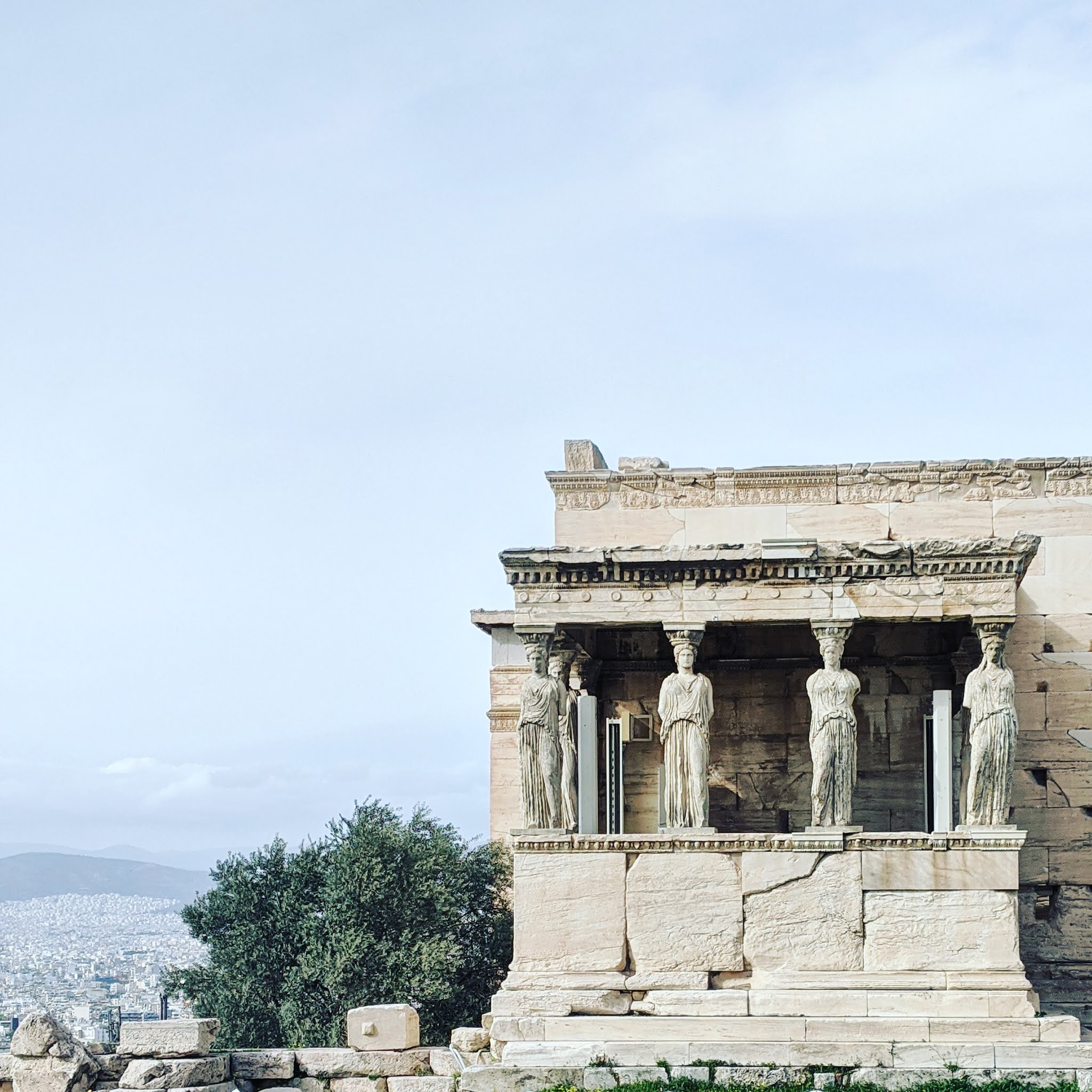 Erechtheion Temple statues in acropolis in Athens, greece. One of the best things to see during a weekend in athens