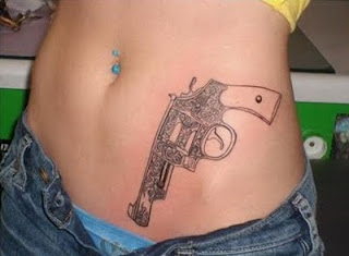 Gun_Front_Lower_Tattoos_For_Girls