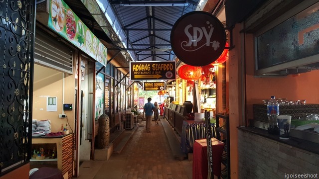 Ao Nang Seafood Street with plenty of seafood restaurants next to the beach.