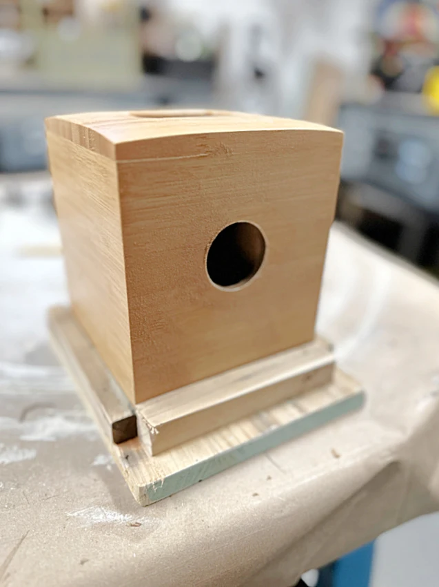 tissue box in wooden base