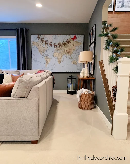 Large wall map with reindeer garland