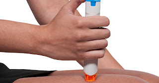 JIA sufferer administering medication pen