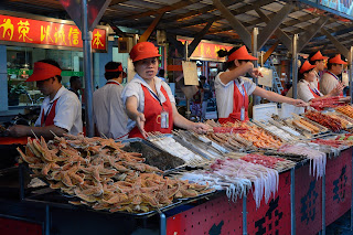 Food for sale at Donghuamen Snack Street