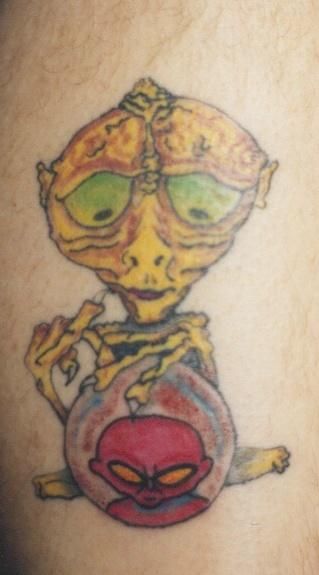 Simple alien tattoo design.