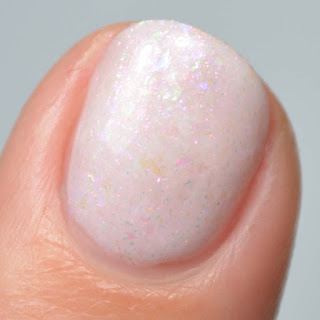 creme nail polish with flakies