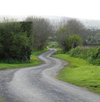 A country road winding into the distance