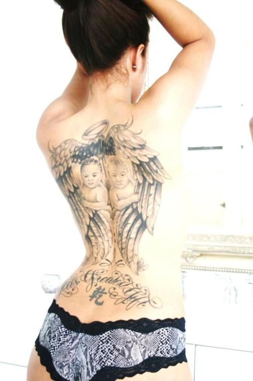 angel wing tattoo. angel wing tattoos on back.