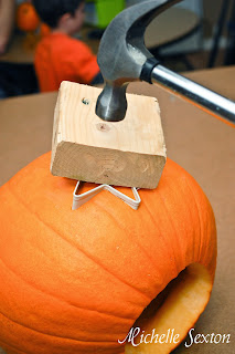 Carving a pumpkin using a cookie cutter