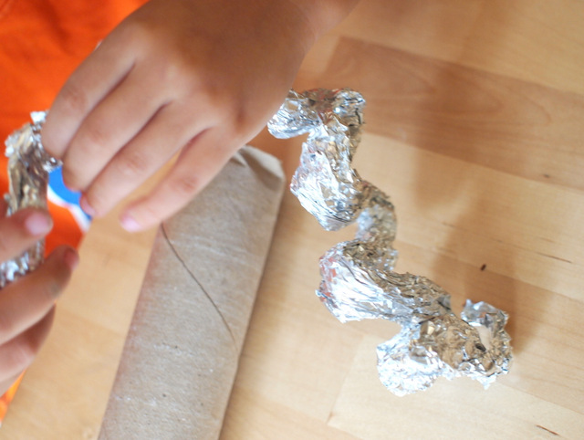 fold the aluminum foil to put inside DIY rain stick