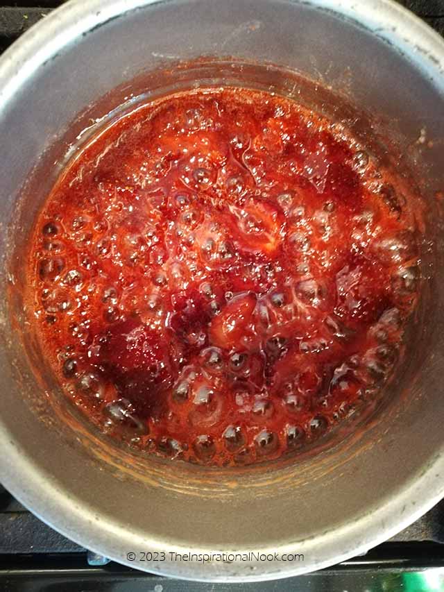 Strawberry jam becoming glossy during cooking