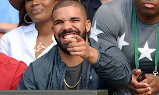 DRAKE POINTING AND LAUGHING