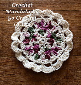 Crochet Mandala by Go Crochet Crazy, to be used as a potholder.