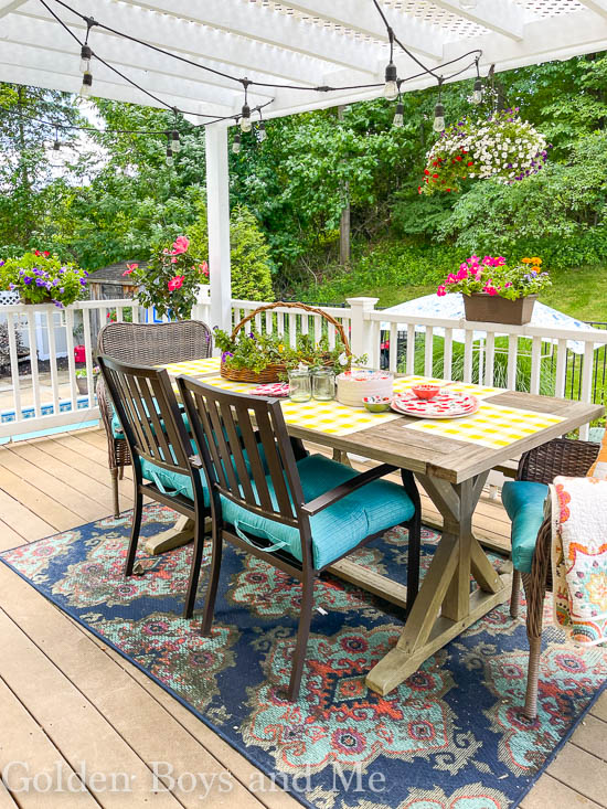 Summer dining porch with DIY pergola - www.goldenboysandme.com