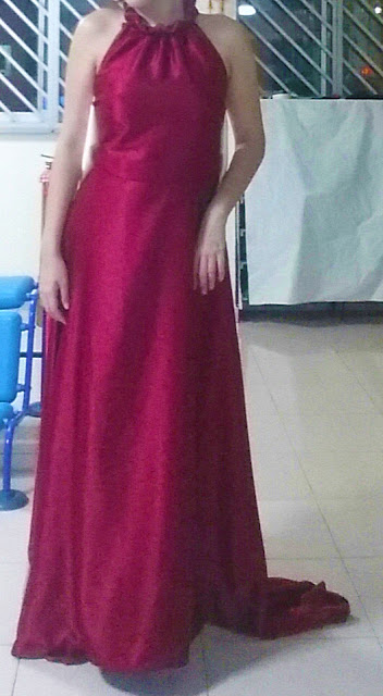 Front view of the halter neck wine red evening gown