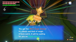 You got the Wind Tingle Statue! It's sandy and kind of rough. It feels weird. It will be waiting for you on Tingle Island.